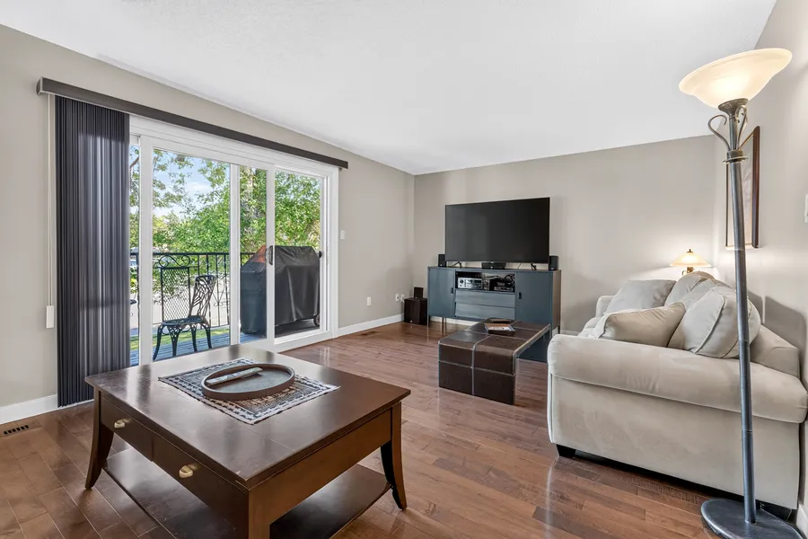 Living room, patio door to deck