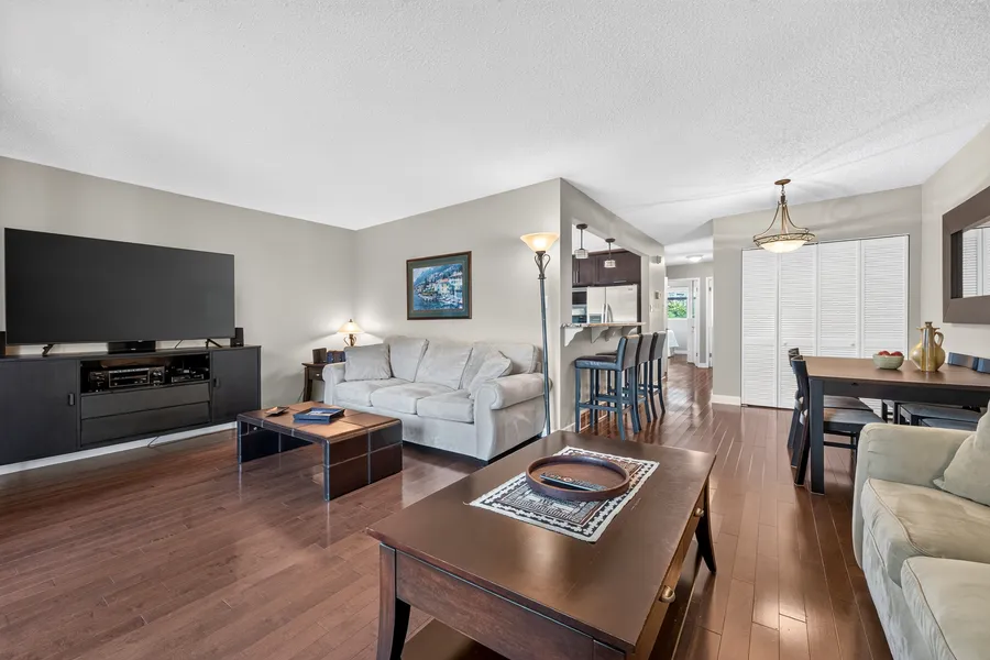 Living room, kitchen beyond